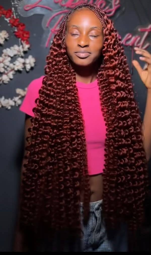 Box braids made with full 360 lace.  With full curls