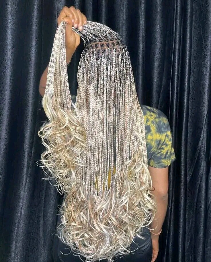 Box braids made with French curls attachment