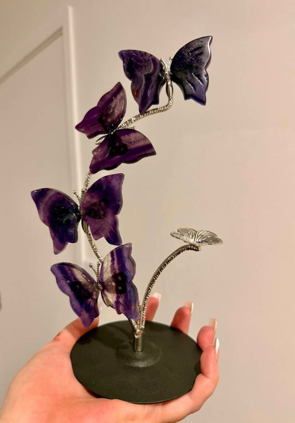 Fluorite butterflies on sphere stand