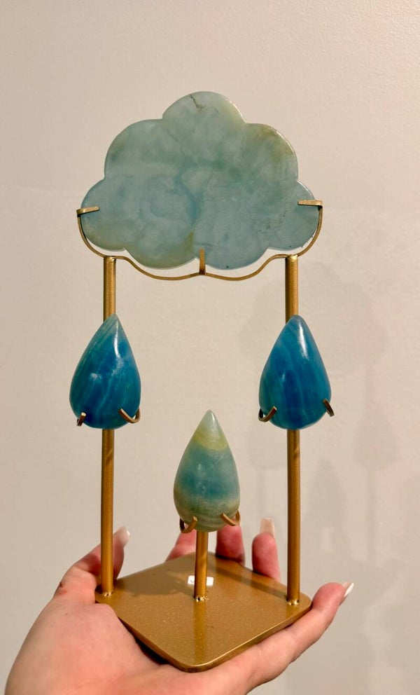 Blue onyx cloud with raindrops on stand