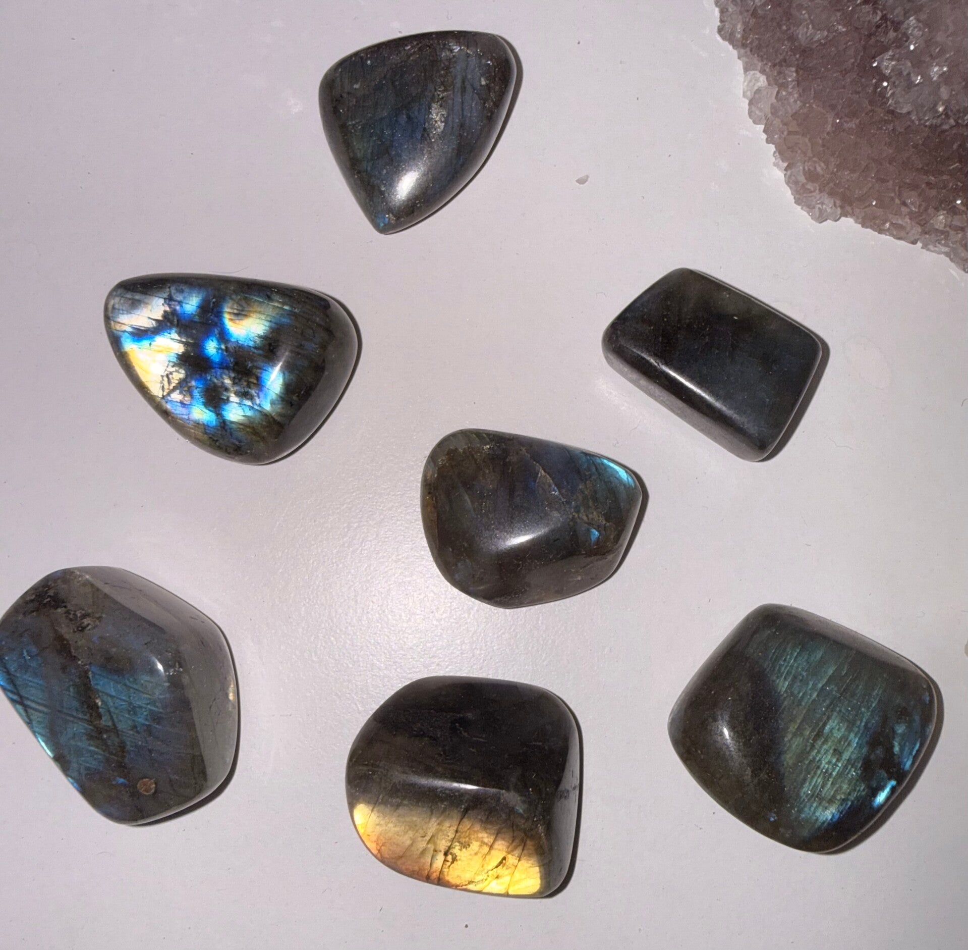 Polished big tumbles labradorite