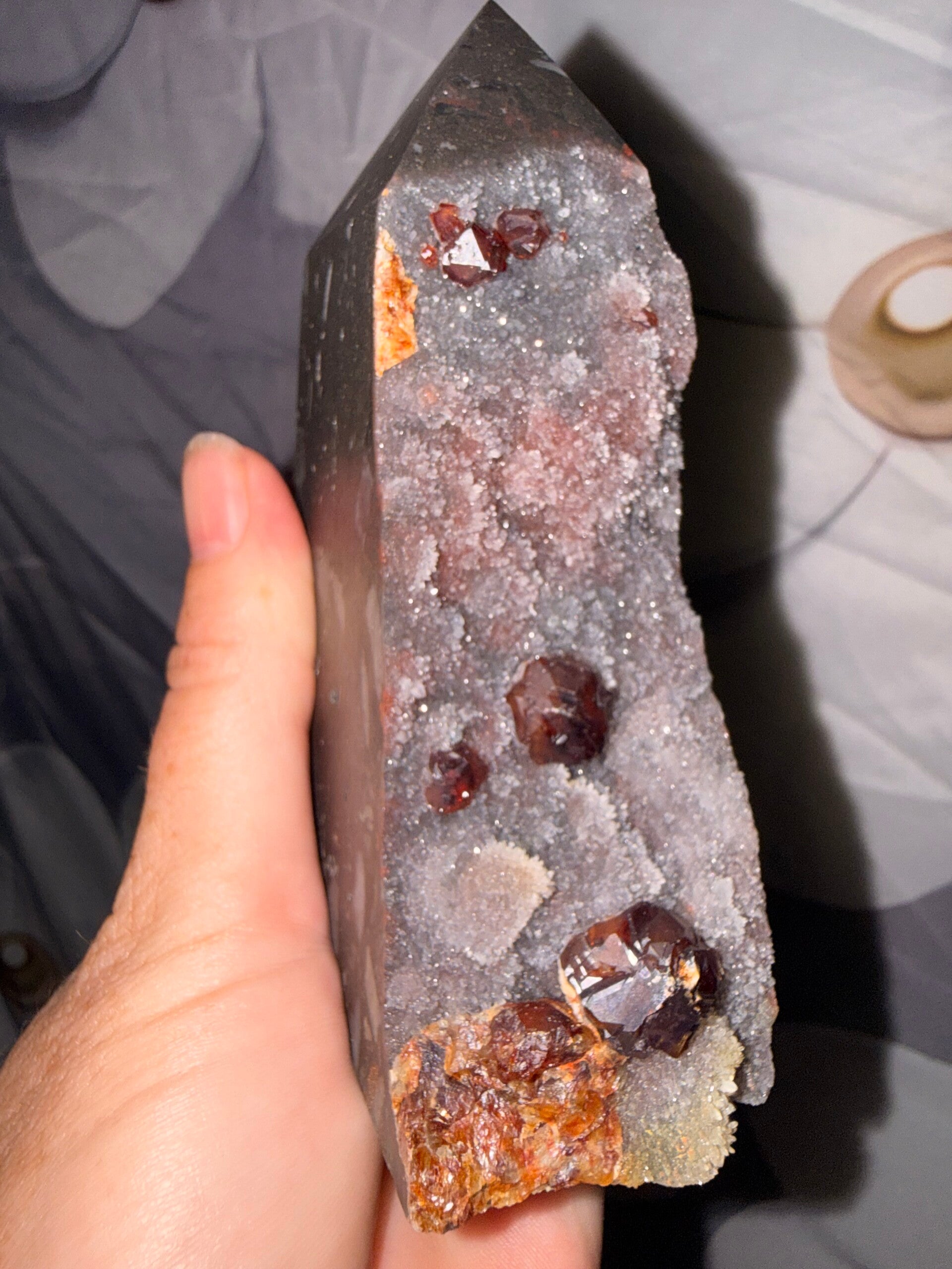 Raw garnet on druzy tower