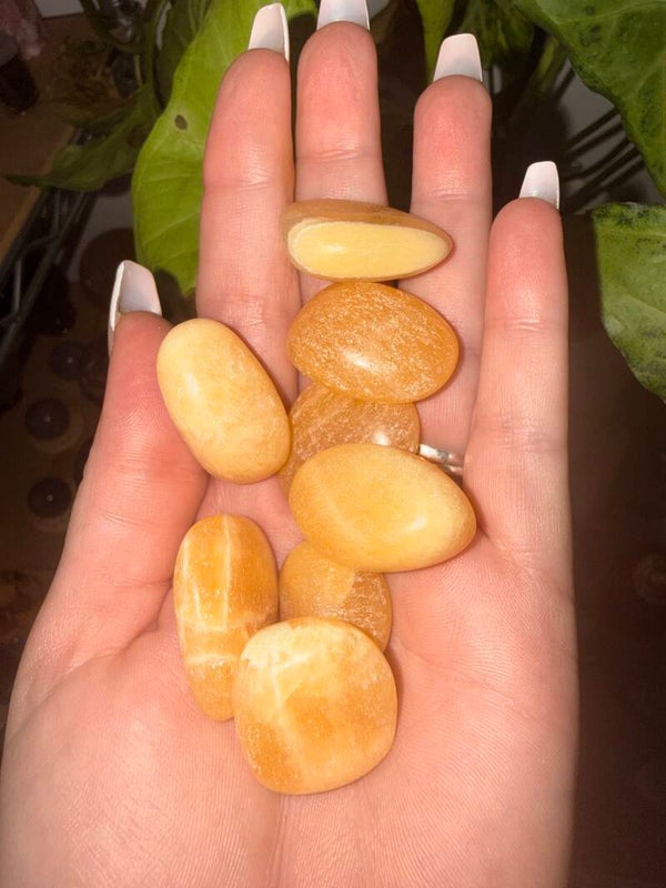 Orange calcite tumbles