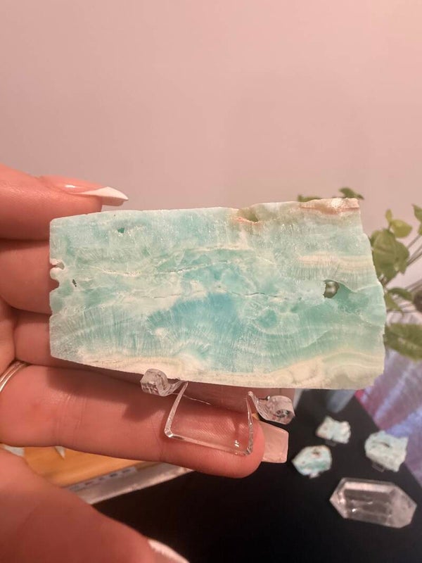 Hemimorphite slabs on stands