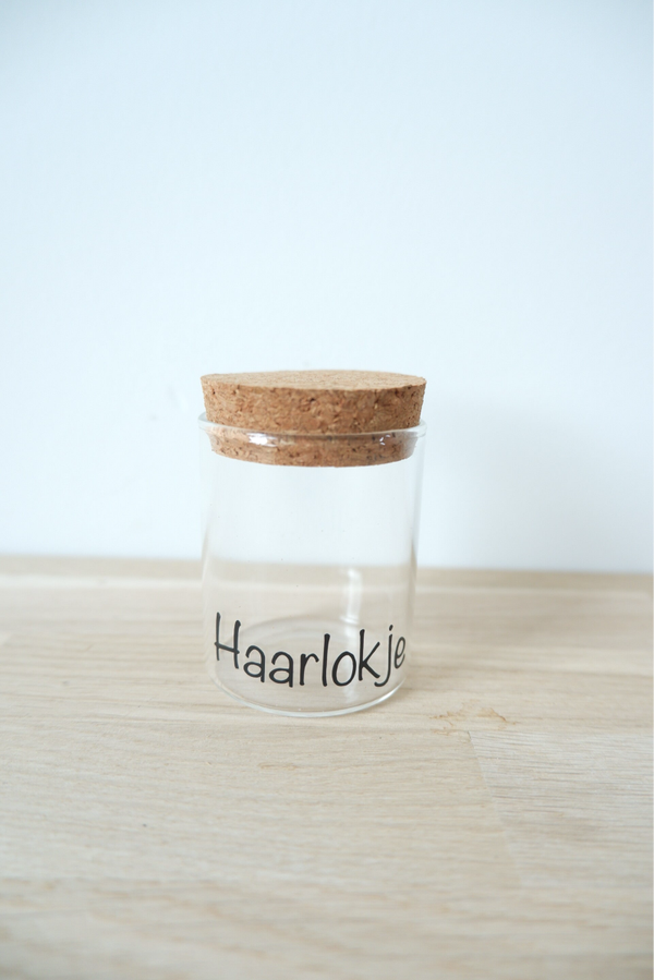 Glazen potje haarlokje