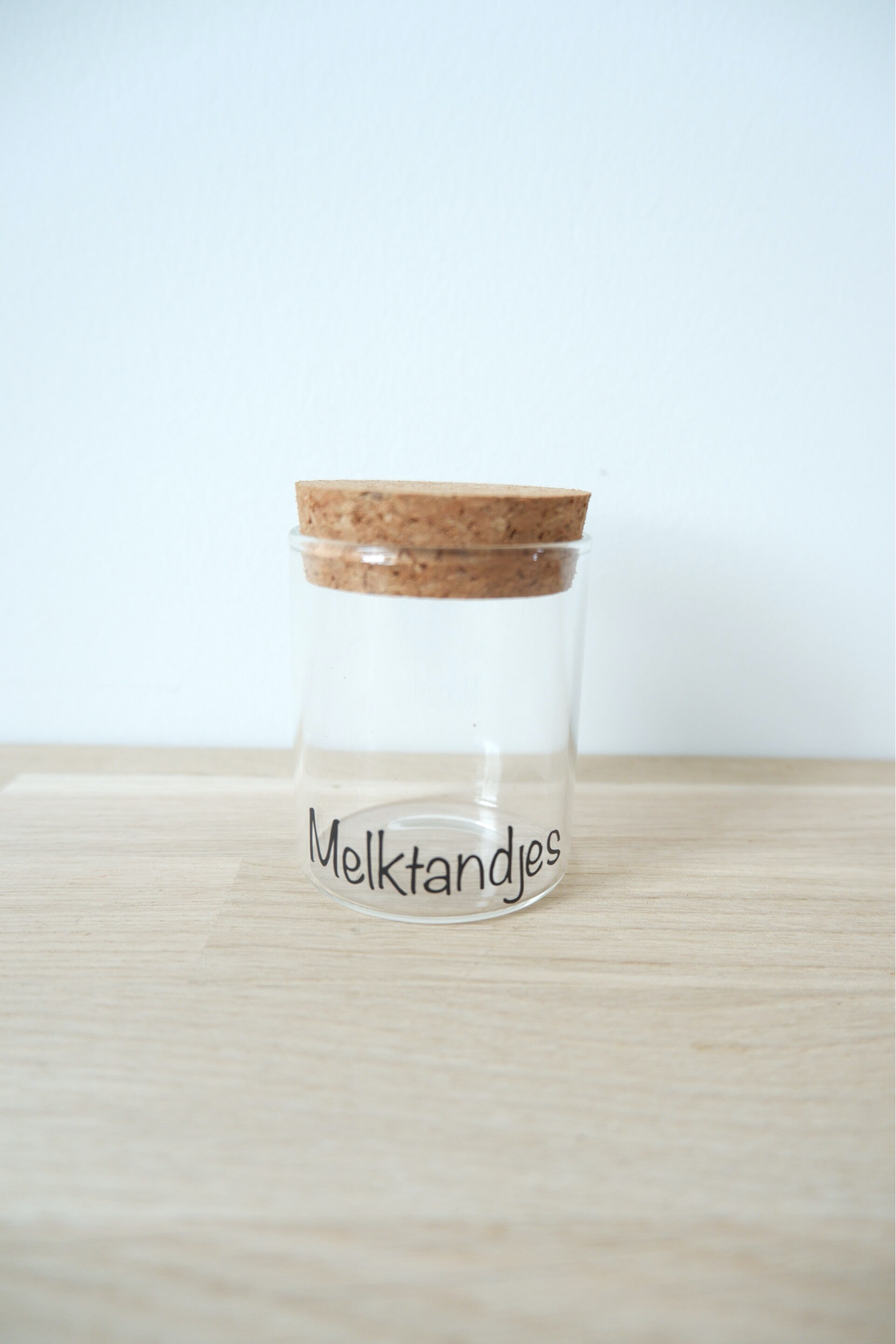 Glazen potje melktandjes