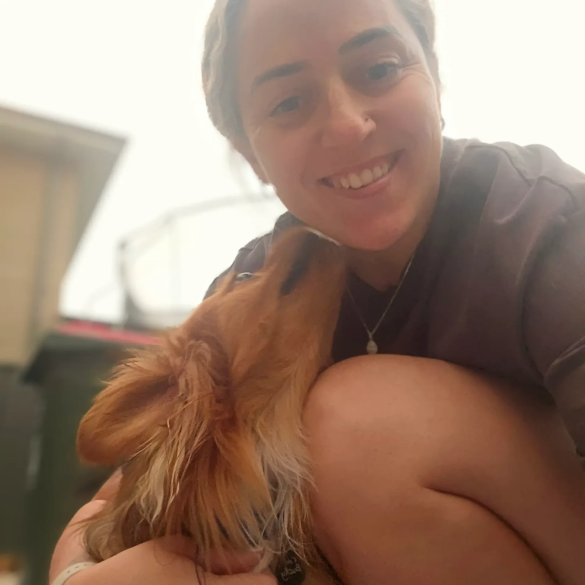 Experienced pet care provider playing with dog – trusted local dog walking services