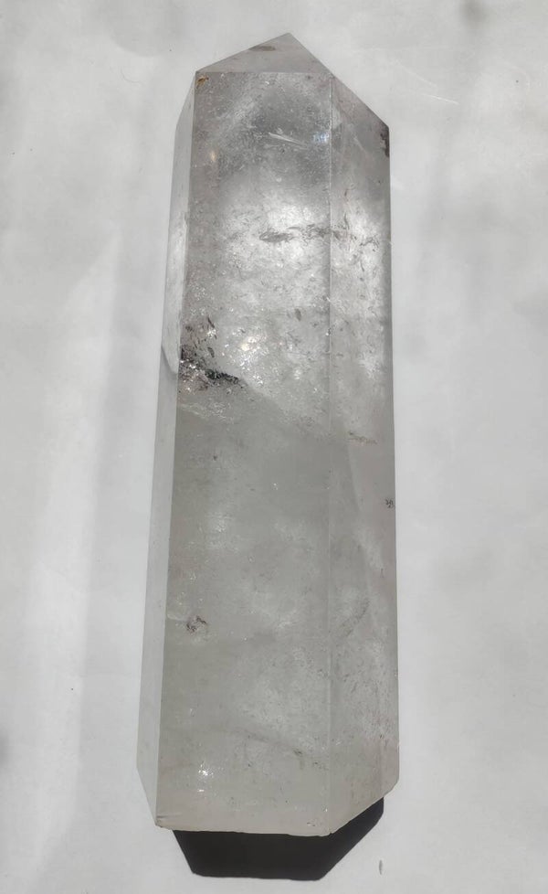 Clear quartz tower with dendrites