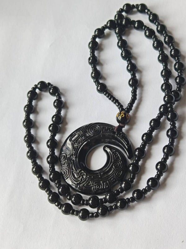 B27 obsidian dragon/ phoenix carved pendant
