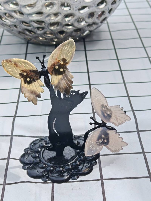 Cat stand with two butterflies