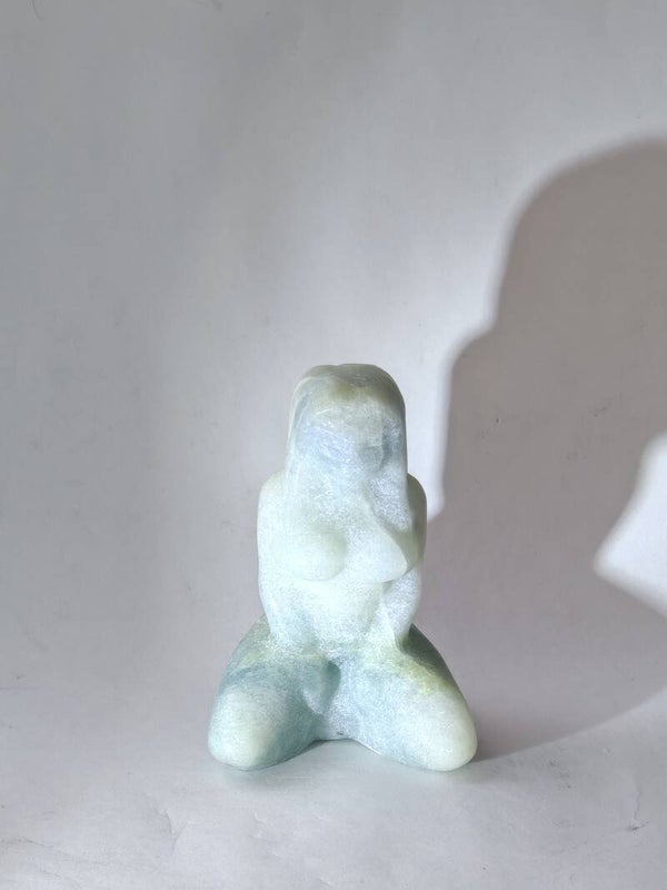 Blue Jade kneeling woman