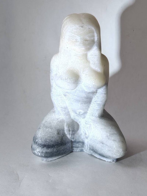 Taiji stone kneeling woman