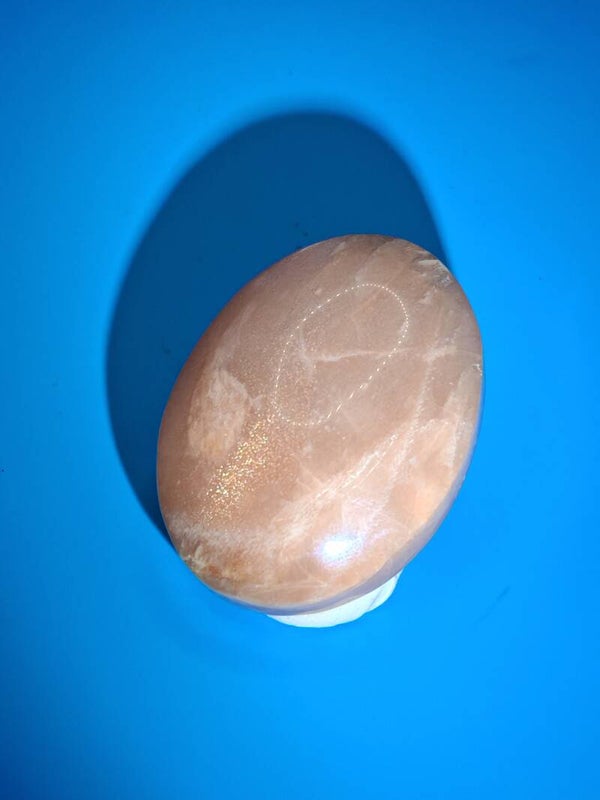 Moonstone and Sunstone Palm Stone 1