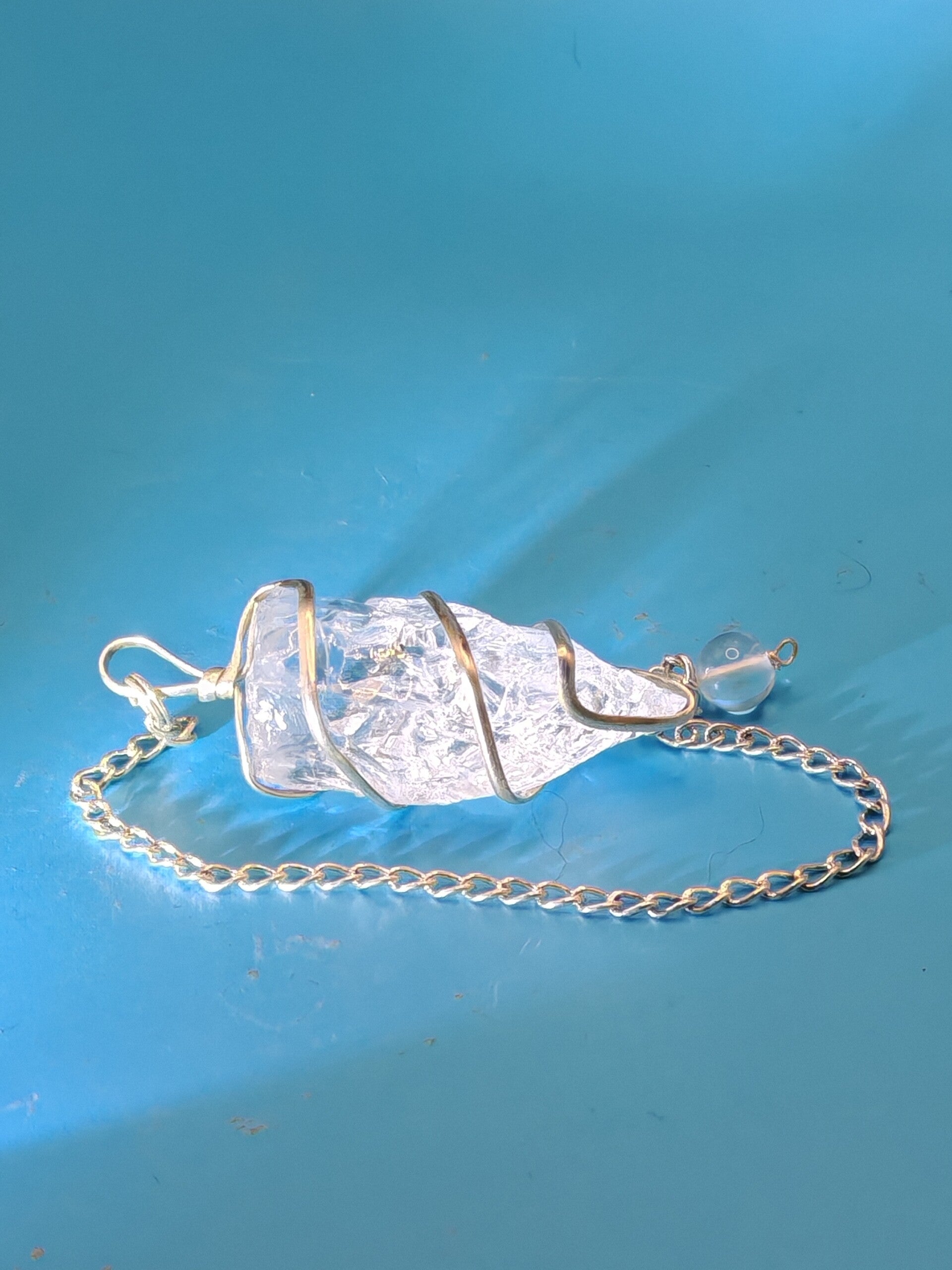 Clear Quartz wrapped Pendulum with chain 12
