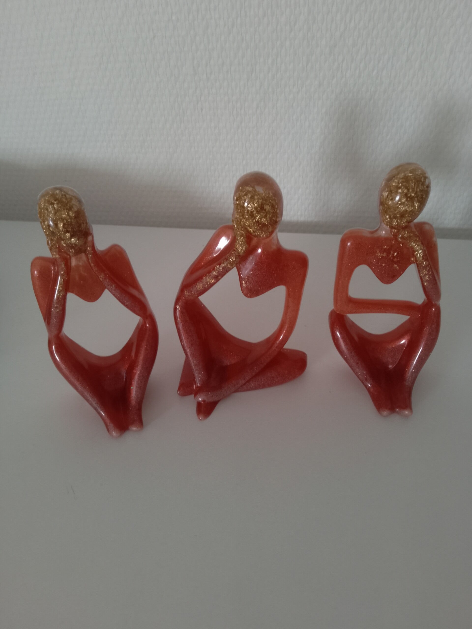 3 statuettes