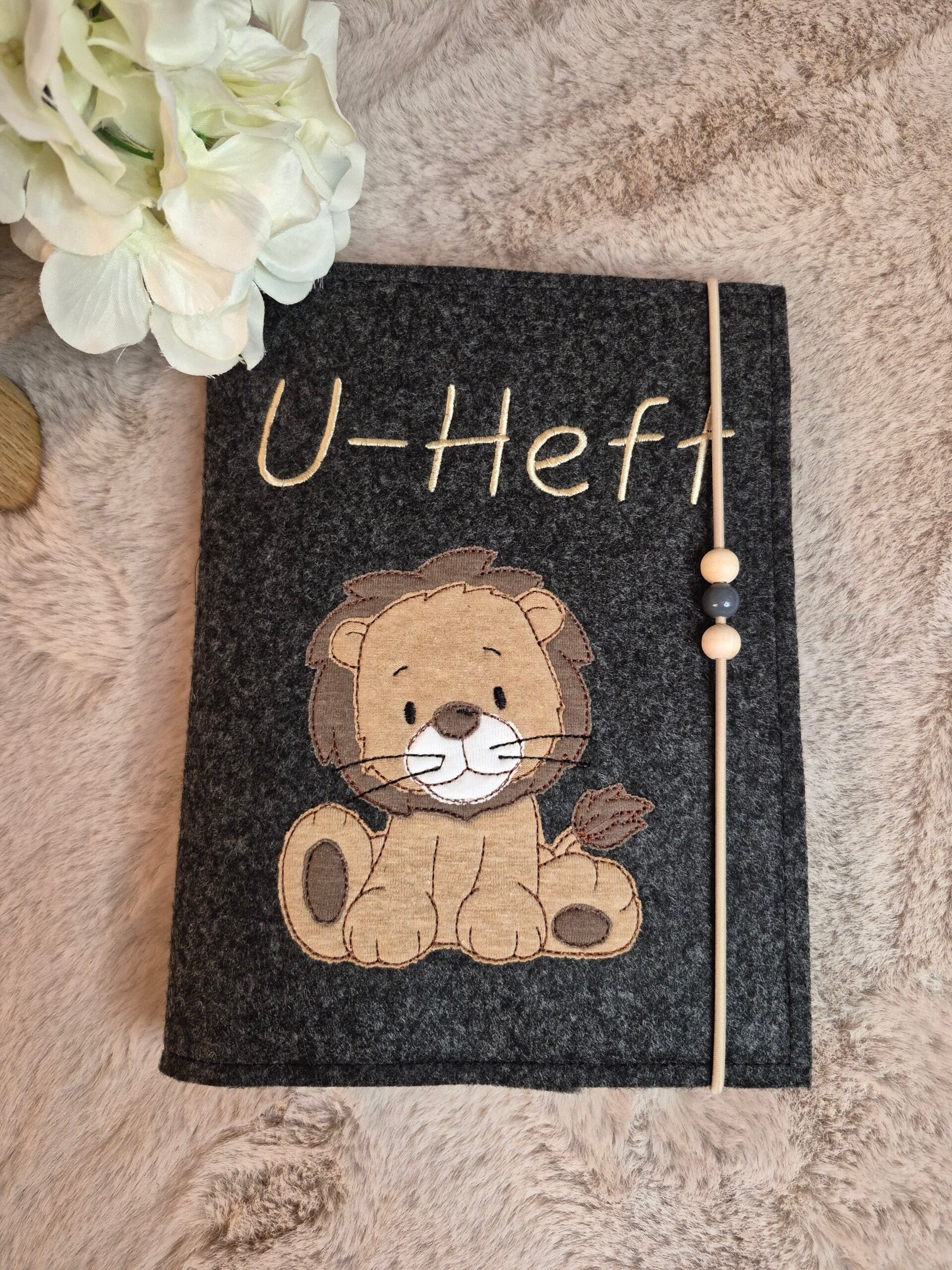 U Heft Löwe