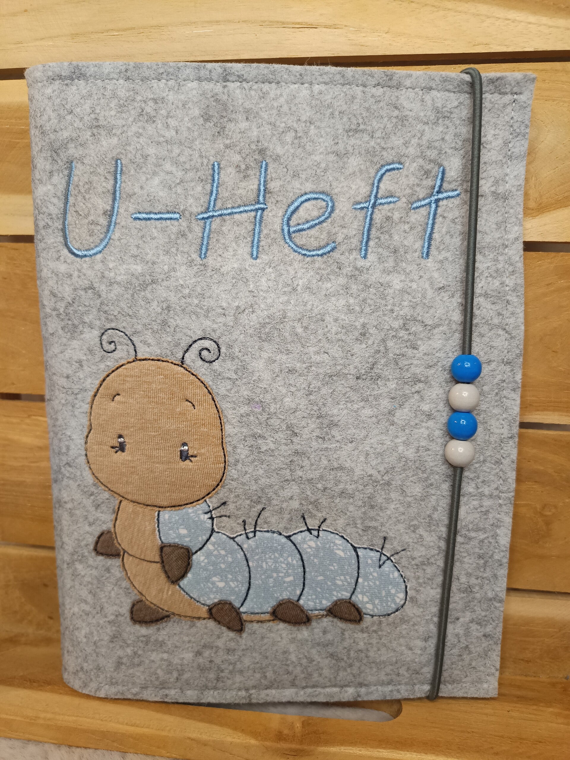 U Heft Raupe