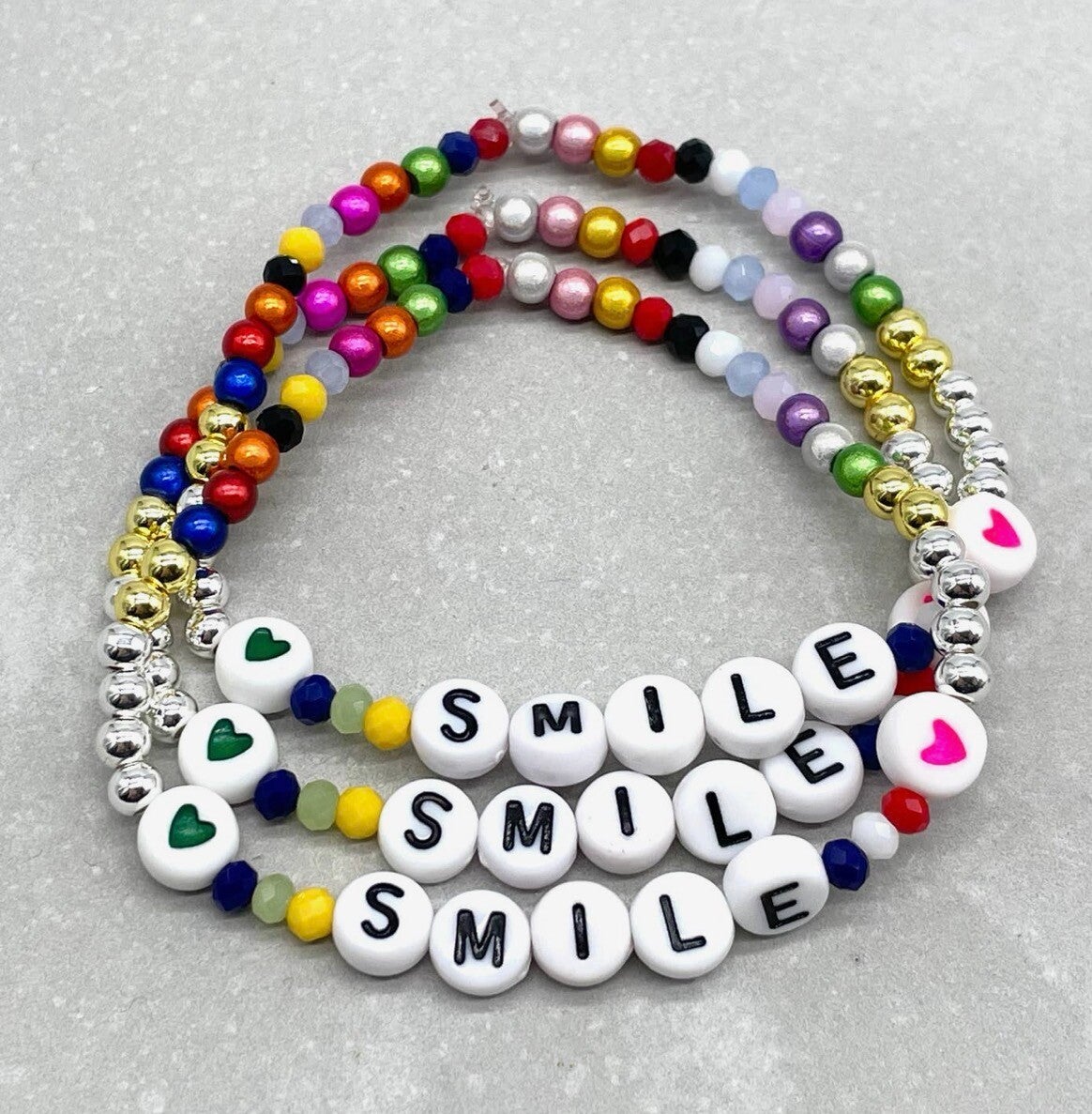 SMILE kleurrijke elastische parelarmband