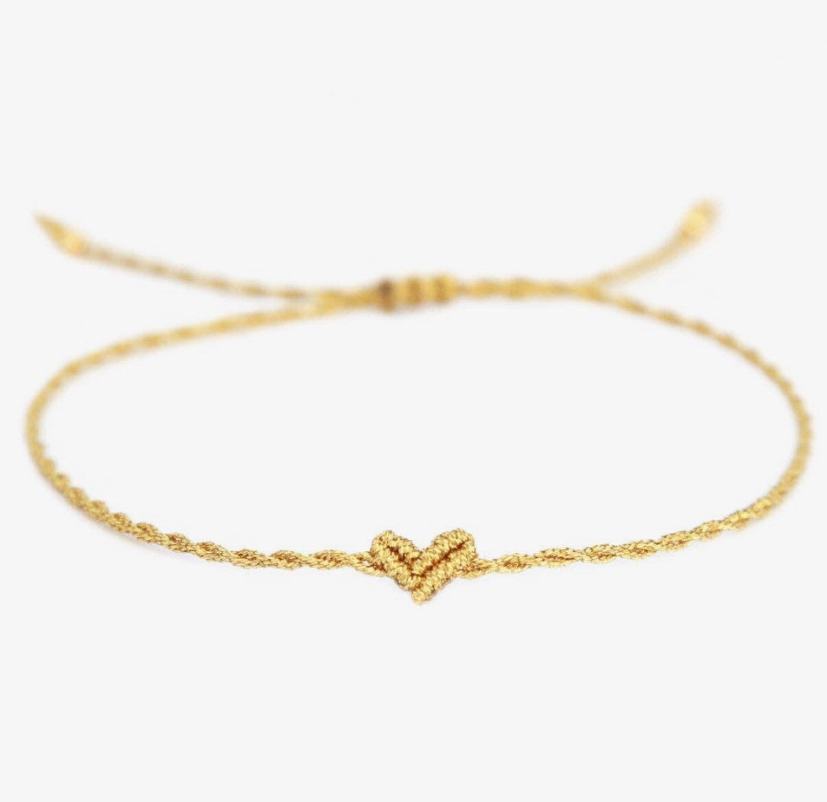 Ibiza fijne gouden armband met gedraaid hartje