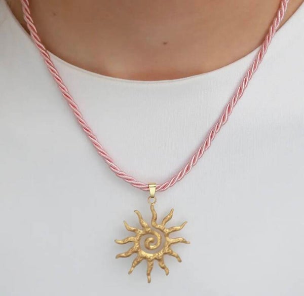 Verklaring ketting met zon roze