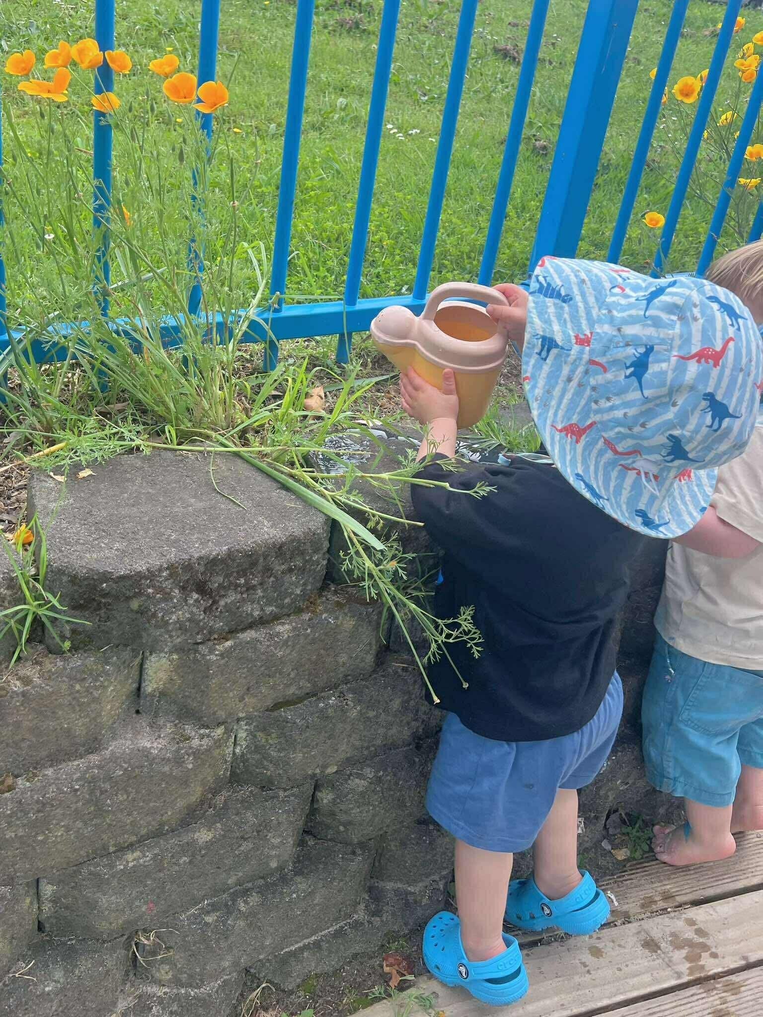 Children gardening and learning about nature at KCC in Howick