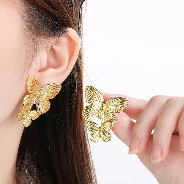 Boucles d’Oreilles Double Papillon – Acier Inoxydable Doré