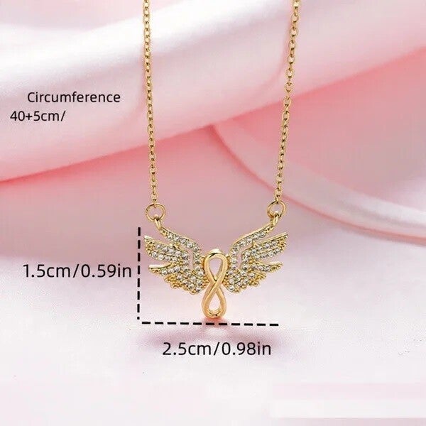 Collier Doré Ailes d’Ange & Signe Infini Incrusté de Strass – Acier Inoxydable