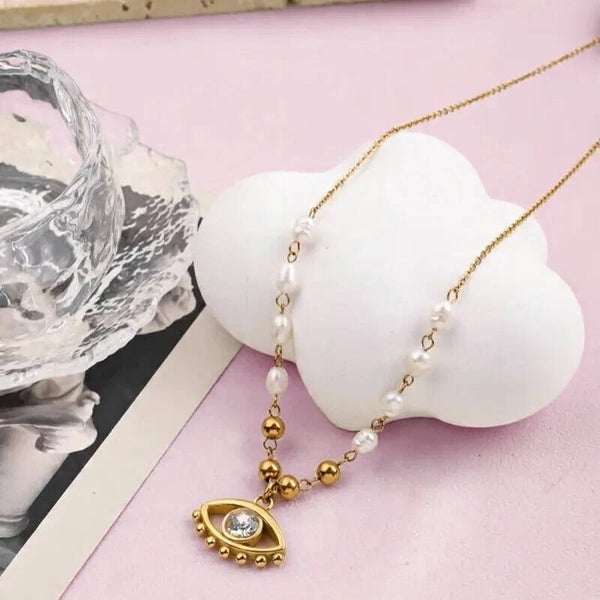 Collier Œil Doré Protecteur – L’Élégance Contemporaine Qui Ne Ternit Jamais
