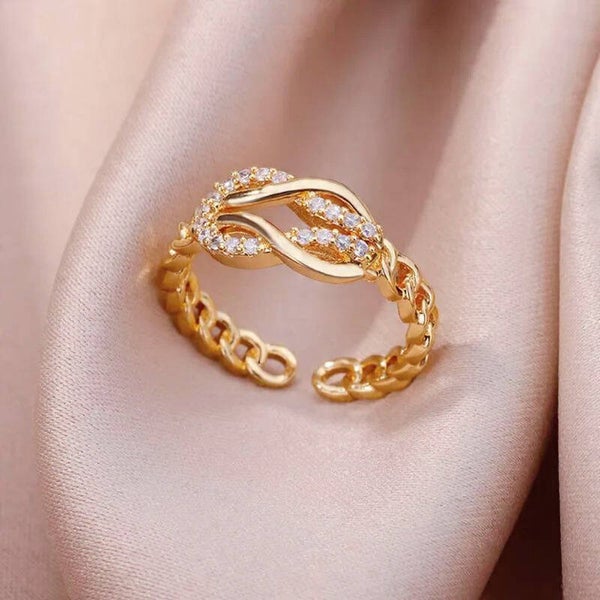 Bague Ajustable "Nœud Infini Scintillant" en Acier Inoxydable Doré avec Zircons