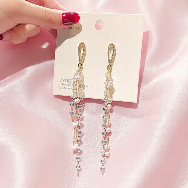 Boucles d’oreilles pendantes dorées perles et cristaux – Élégance intemporelle