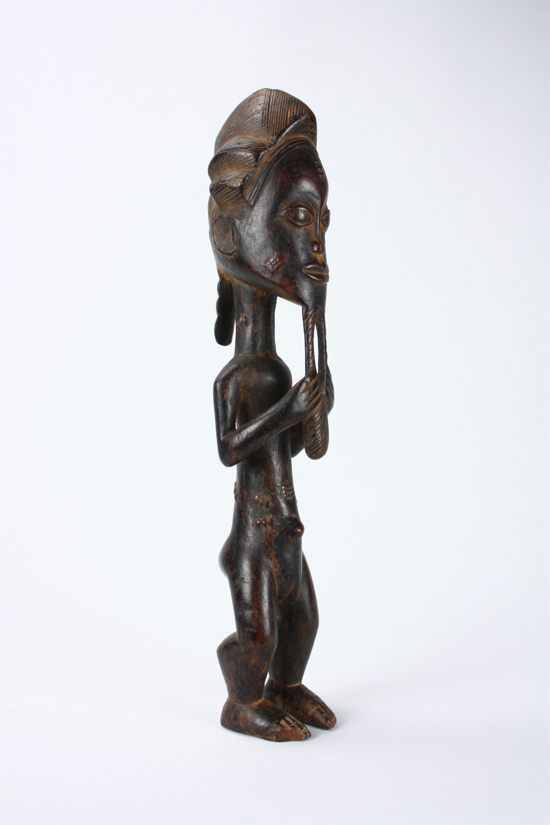 Lot A11 - Baule male figure