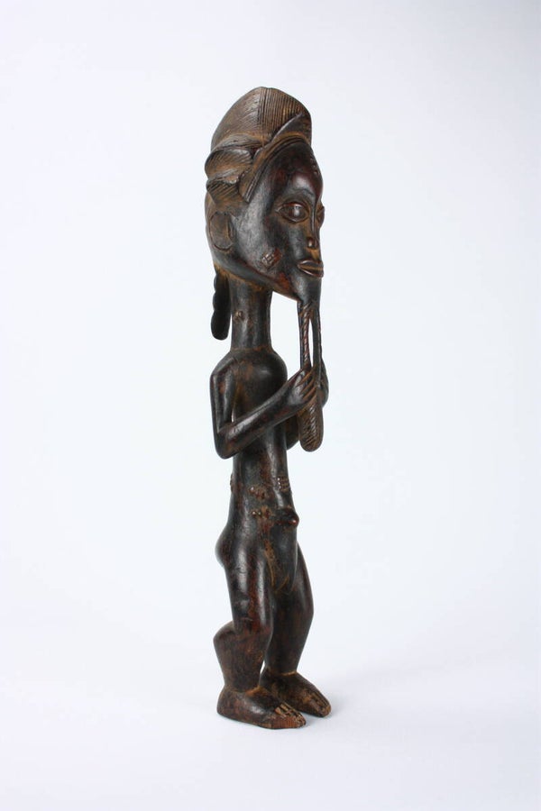 Lot A11 - Baule male figure