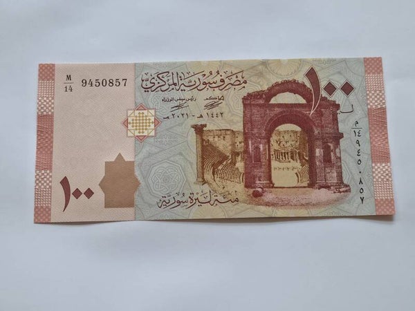 Bankbiljet: 100 Syrian Pounds.
