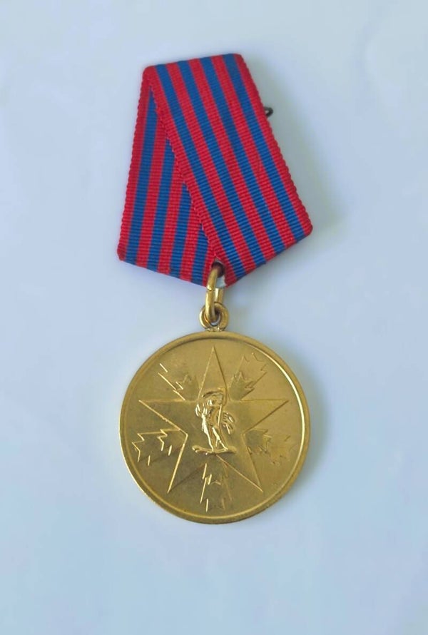 Joegoslavische Medaille van Verdienste voor het Volk.