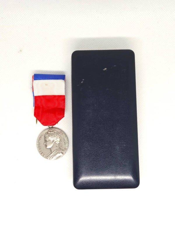 Médaille d'Honneur du Travail.