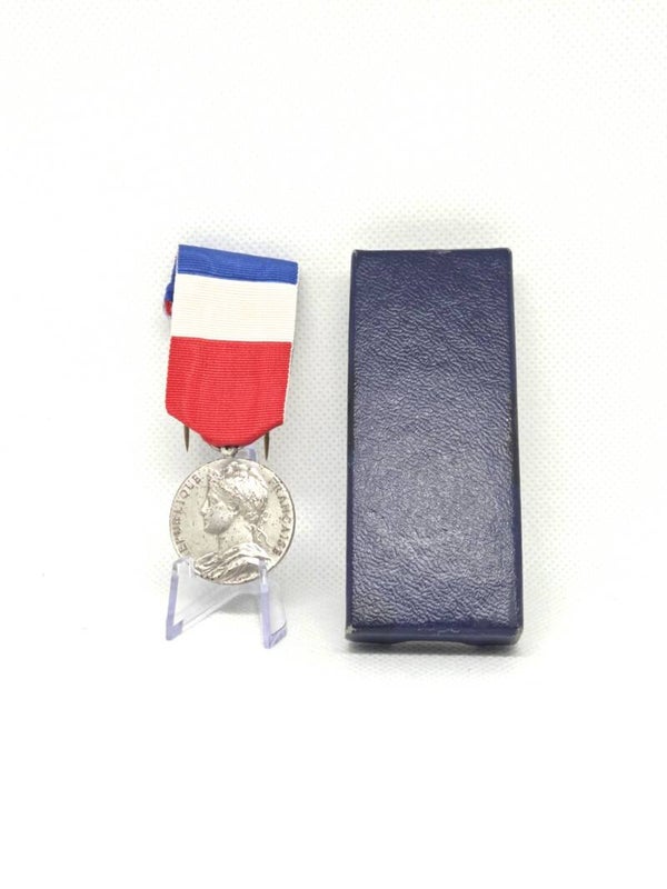 Médaille d'Honneur du Travail.