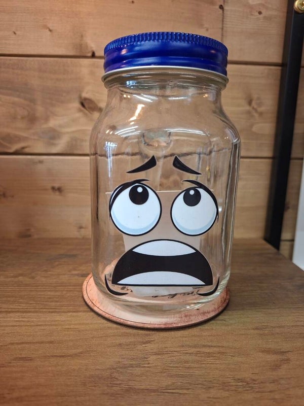 Faces mason jar