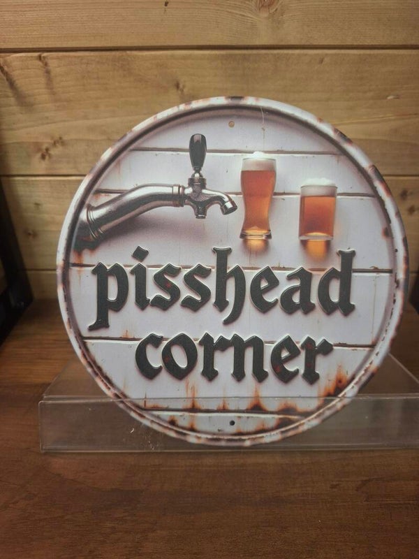 Pisshead corner sign