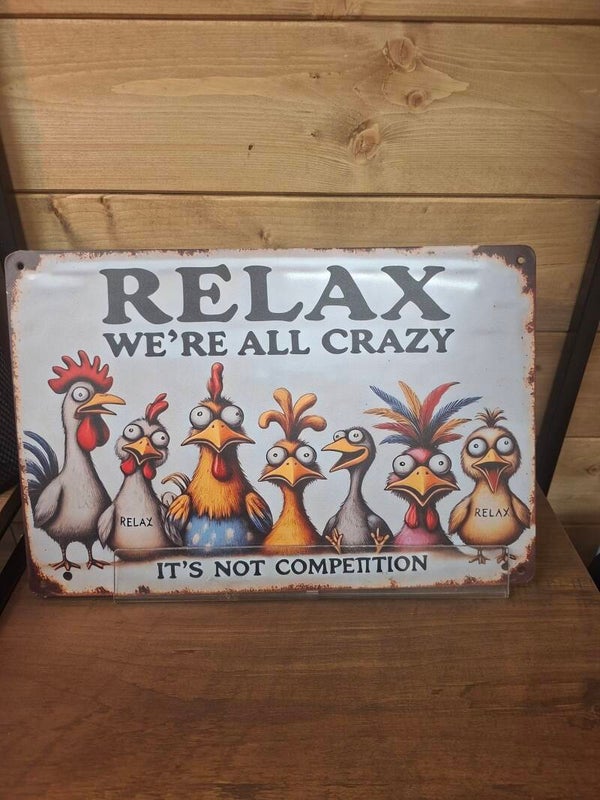 Relax we're all crazy sign