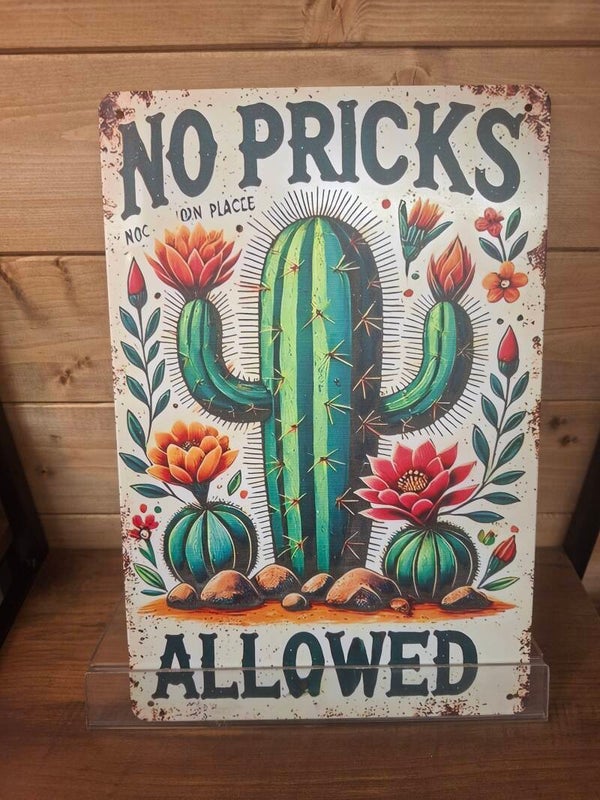 No pricks allowed sign