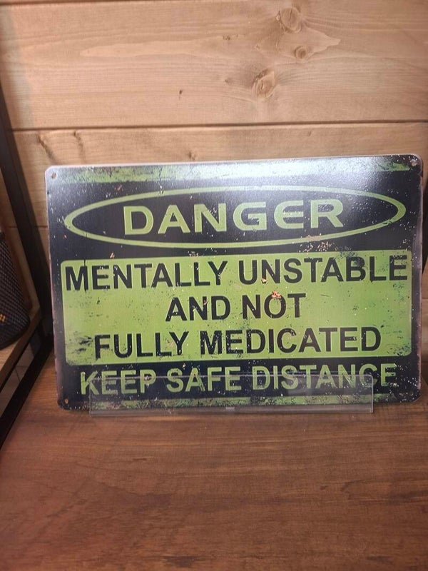 Danger, mentally unstable sign
