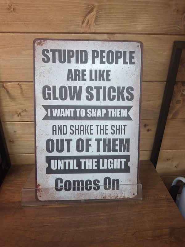 Stupid people are like glow sticks sign