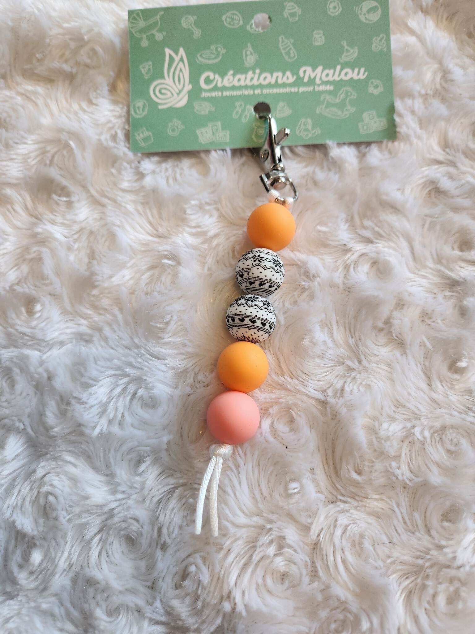 attache zipette/porte clé sweater