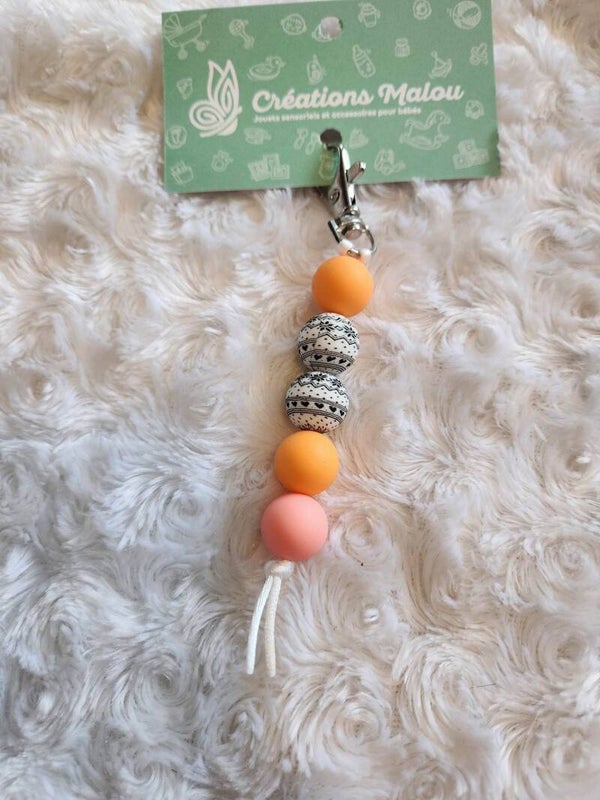 attache zipette/porte clé sweater