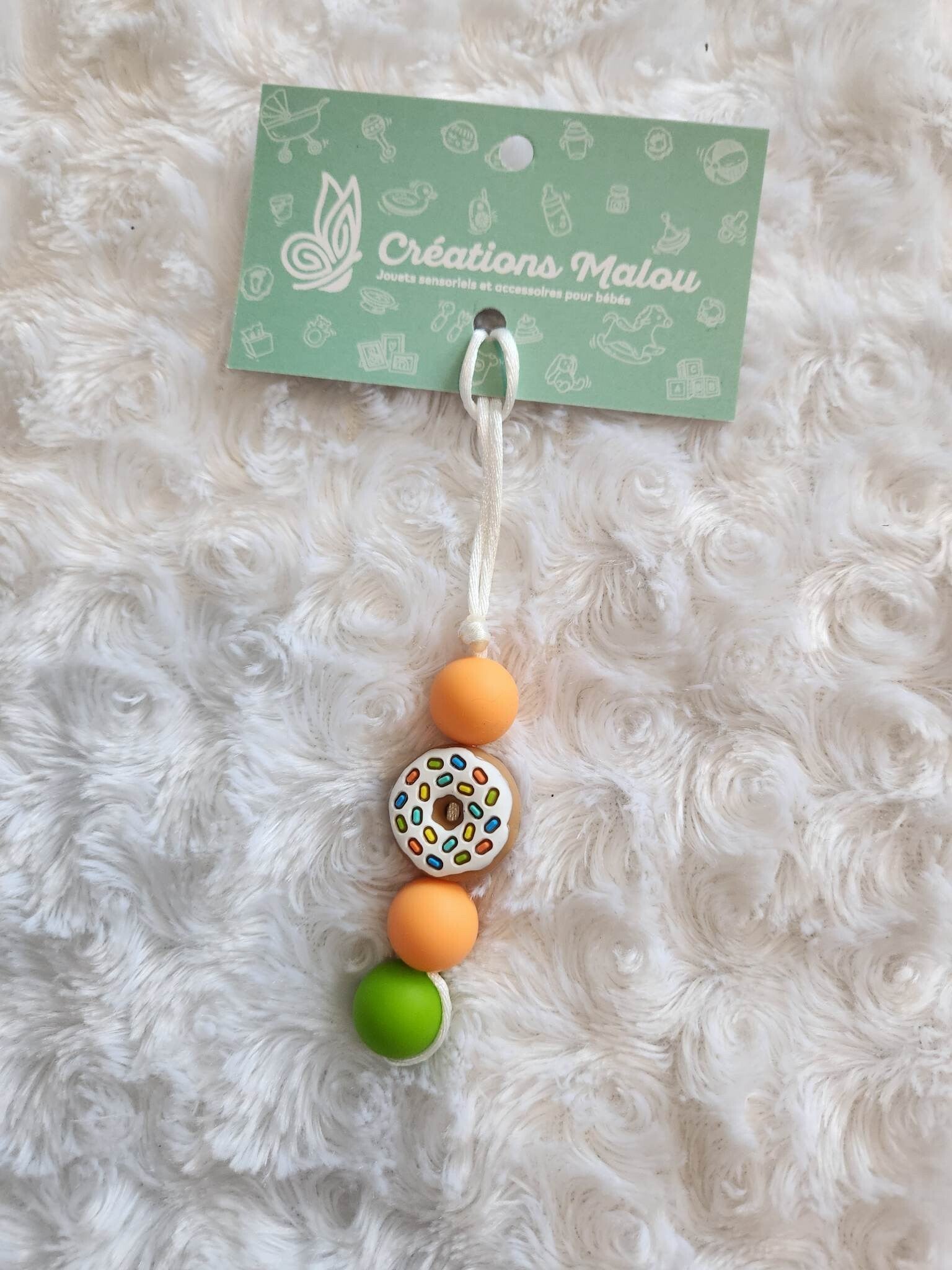 attache zipette/porte clé beigne