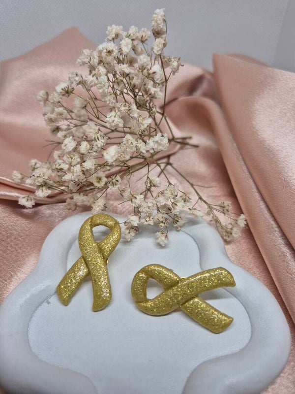 Pins en or