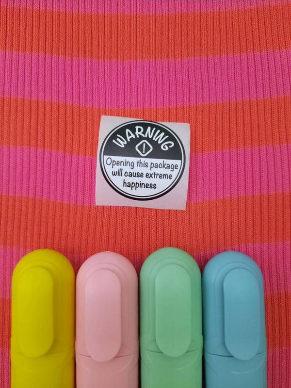 ‘Happiness Warning’ sticker