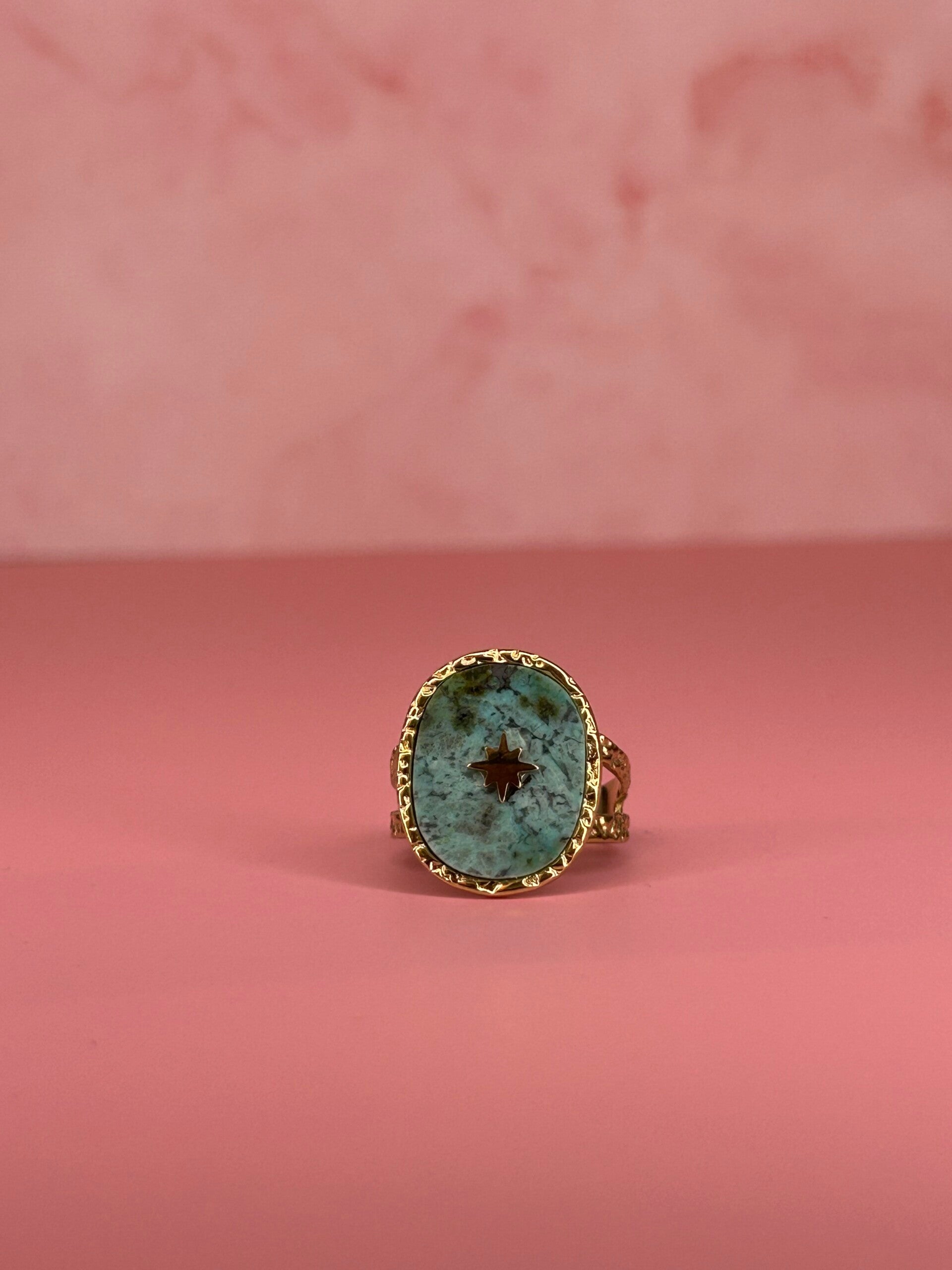 Verstelbare ring blauw/groen met ster (goud)