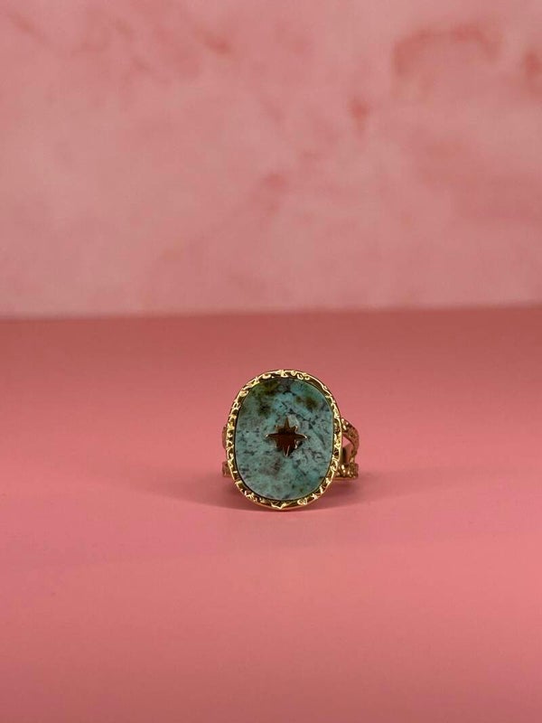 Verstelbare ring blauw/groen met ster (goud)