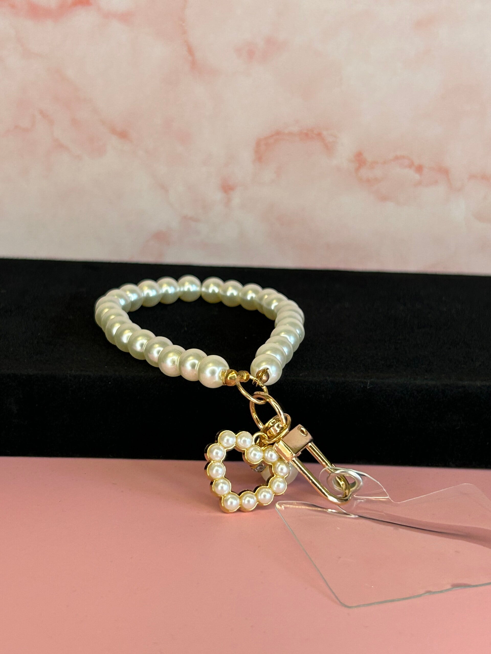 Telefoon handstrap parel